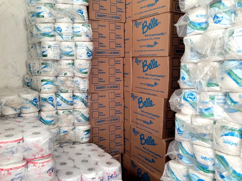 Bel Impex Rose Belle tissue cartons stacked in the Homatbliss warehouse
